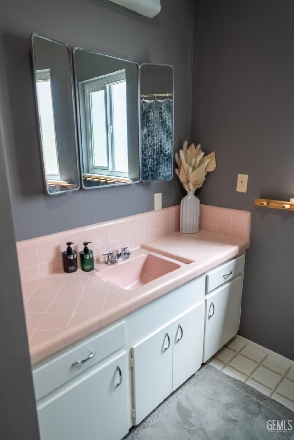 Undisclosed Address Tehachapi, CA 93561 - Photo 25 of 46 a bathroom with a sink and a mirror