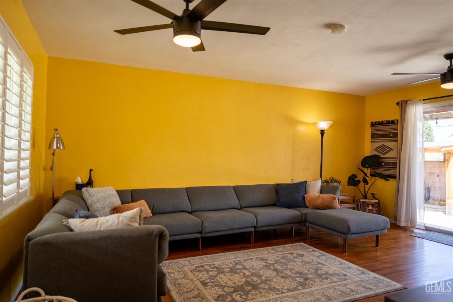 Undisclosed Address Tehachapi, CA 93561 - Photo 5 of 46 a living room with furniture and a wooden floor