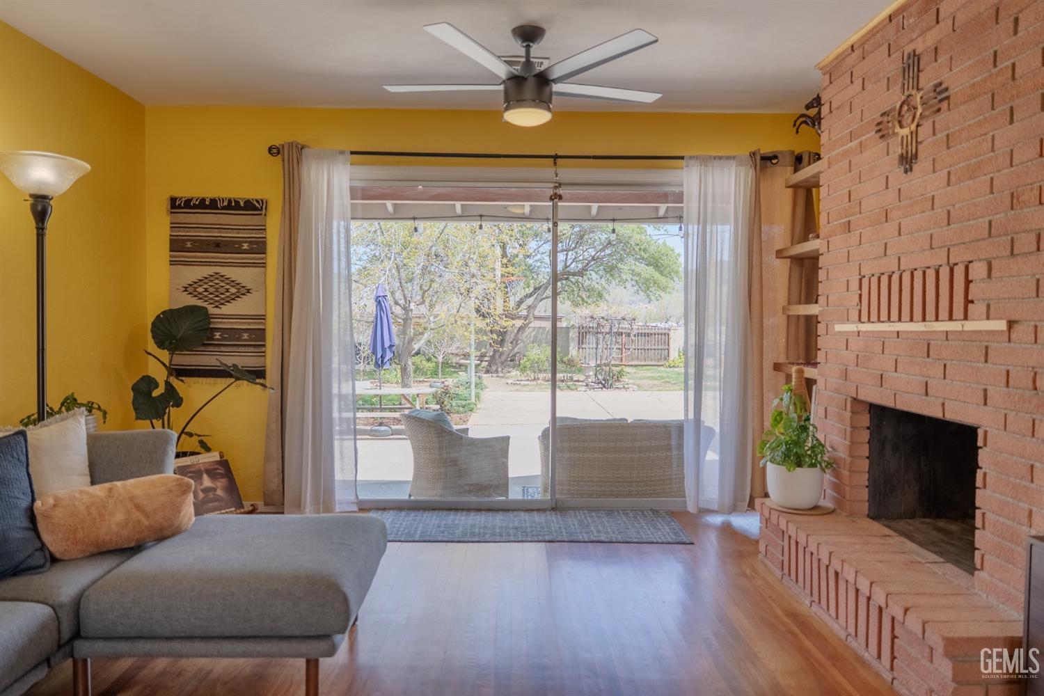 Undisclosed Address Tehachapi, CA 93561 - Photo 7 of 46 a living room with furniture and a fireplace