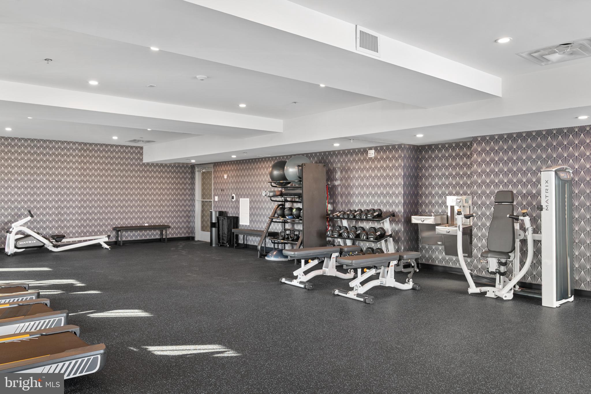 10339 Old Georgetown Road, Unit 205 Bethesda, MD 20814 - Photo 12 of 14 a view of a room with gym equipment