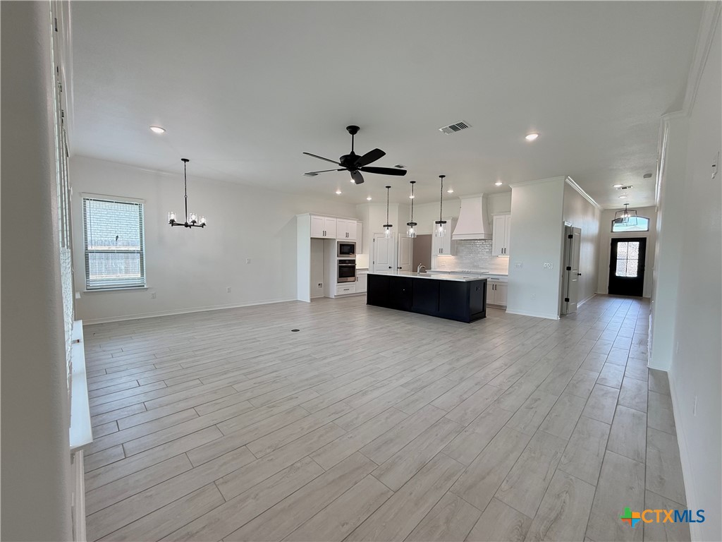 2016 Yarrow Road Temple, TX 76502 - Photo 4 of 30 a view of kitchen and hall with wooden floor