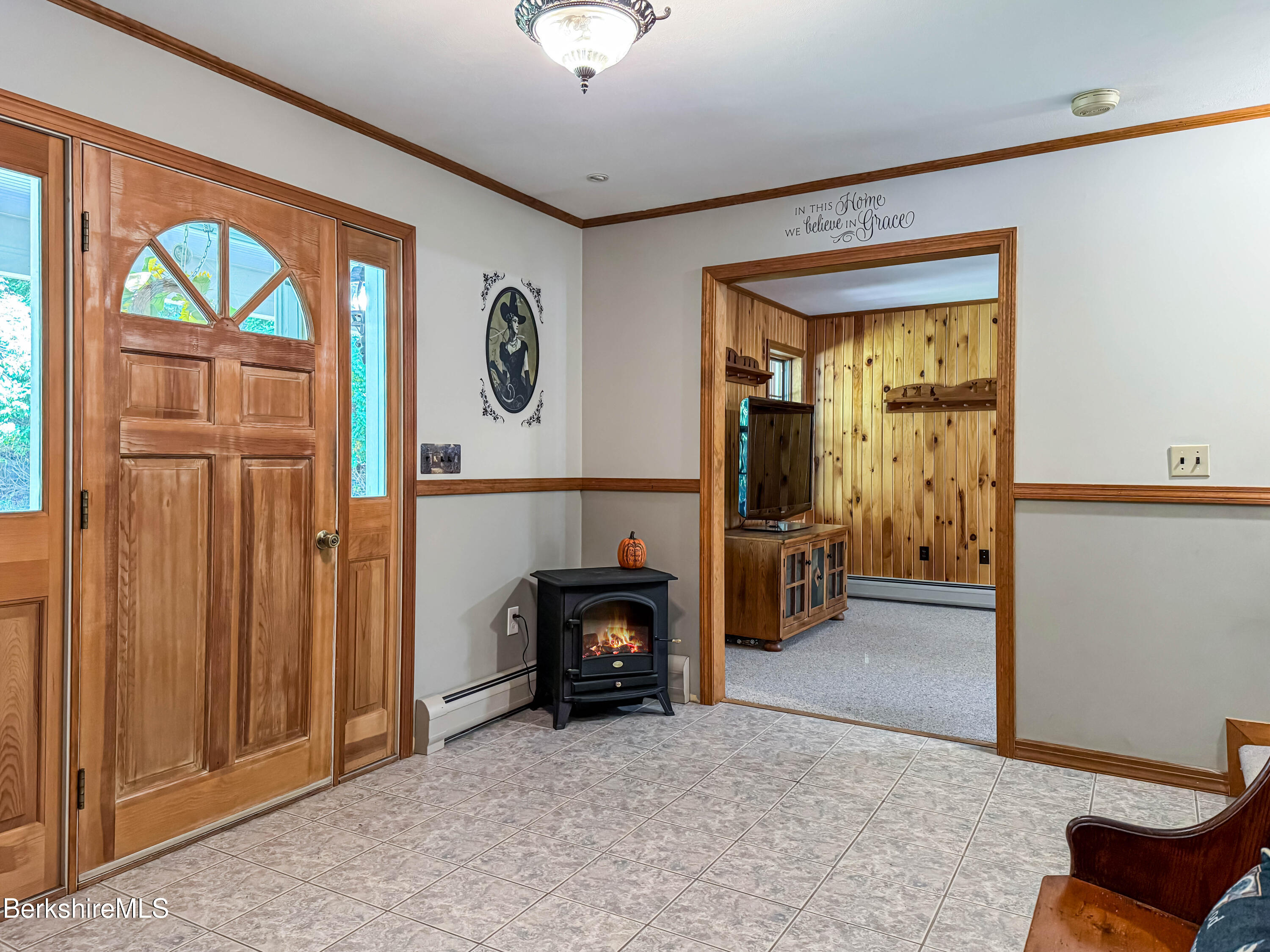 829 Main Road Savoy, MA 01256 - Photo 7 of 38 a living room with furniture and a fireplace