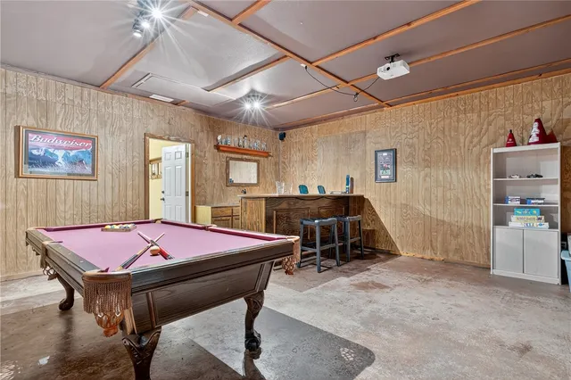 a patio with table and chairs