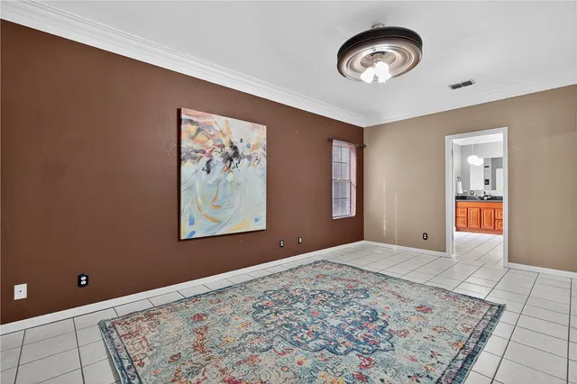 a spacious bathroom with a mirror a sink and a bathtub