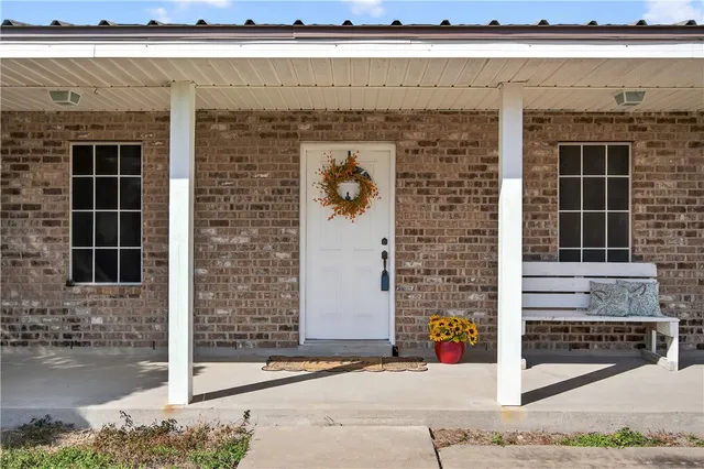 a front view of a house with garage