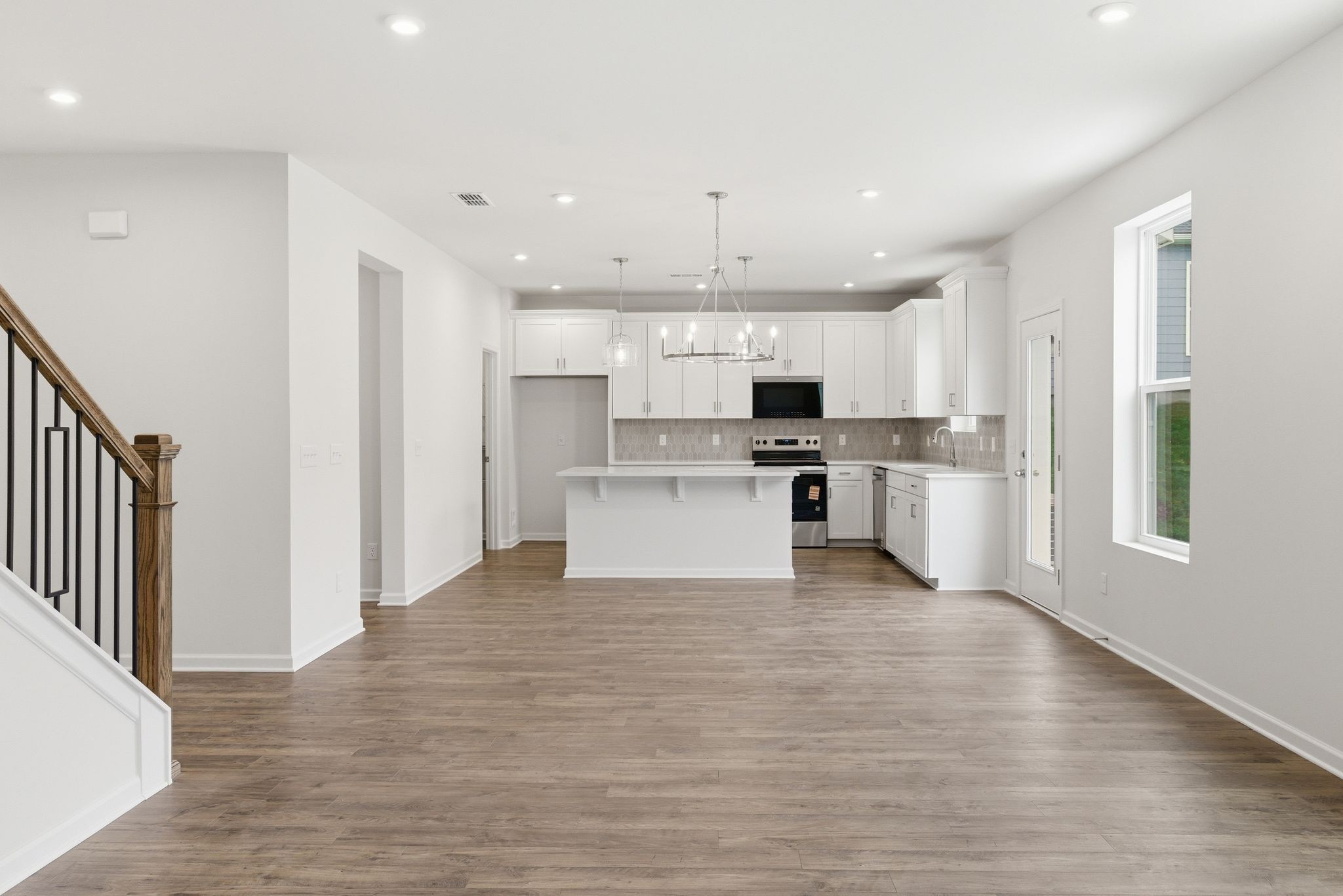 1310 Godwin Road Hermitage, TN 37076 - Photo 11 of 32 a view of kitchen with wooden floor and electronic appliances