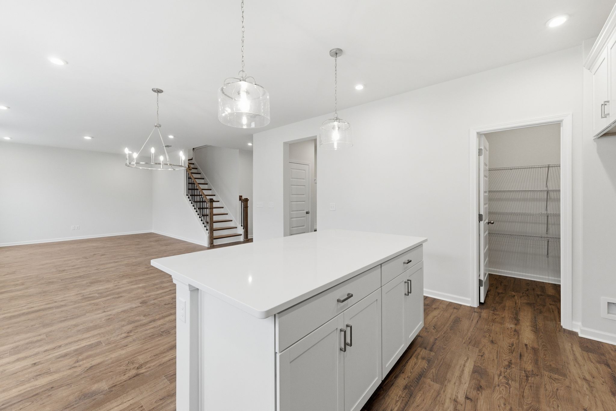 1310 Godwin Road Hermitage, TN 37076 - Photo 15 of 32 a kitchen with a refrigerator a sink and wooden floor