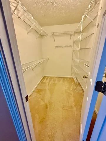 a bathroom with a shower and a bath tub