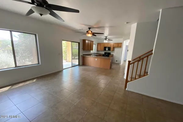 a view interior of a house with kitchen view and windows