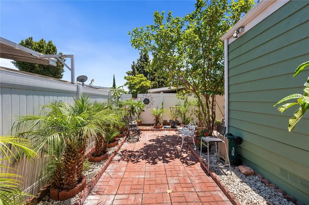 17701 Avalon, Unit SP124 Carson, CA 90746 - Photo 17 of 32 a view of a backyard with sitting area