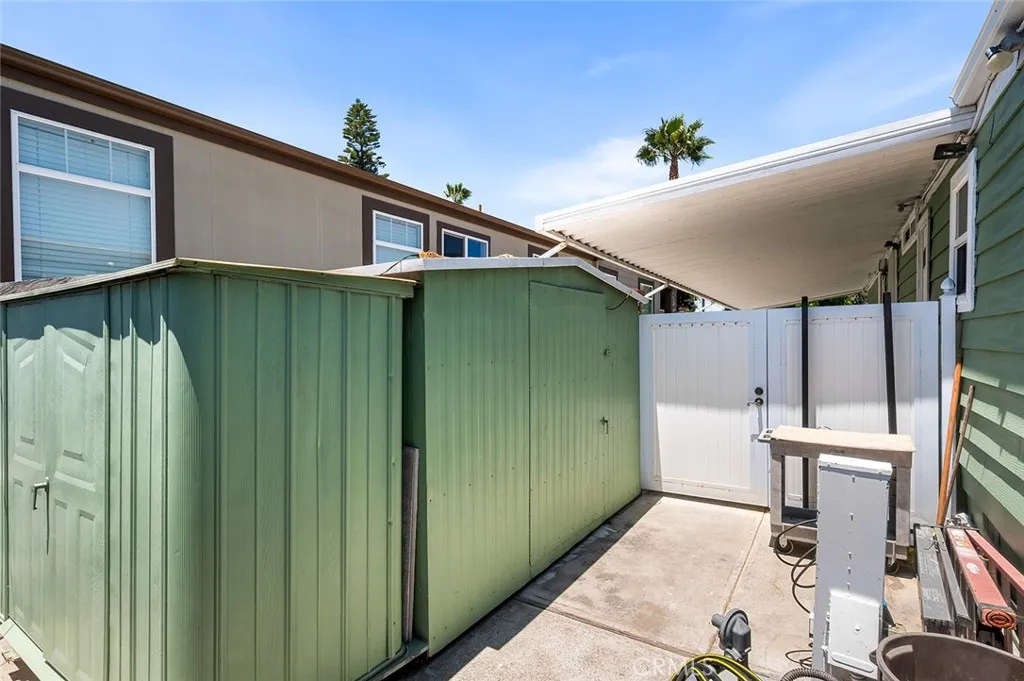 17701 Avalon, Unit SP124 Carson, CA 90746 - Photo 21 of 32 a house view with a backyard space