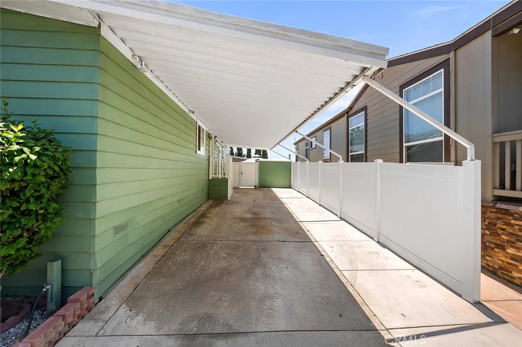 17701 Avalon, Unit SP124 Carson, CA 90746 - Photo 23 of 32 a view of a house with a backyard