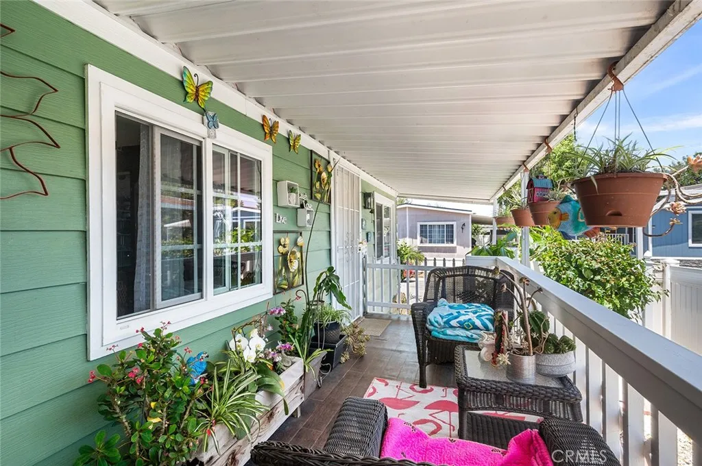 17701 Avalon, Unit SP124 Carson, CA 90746 - Photo 4 of 32 a front view of a house with garden