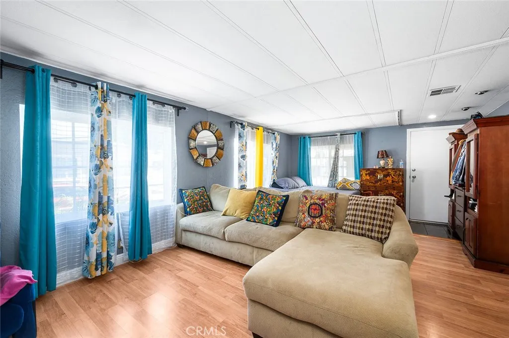 17701 Avalon, Unit SP124 Carson, CA 90746 - Photo 6 of 32 a living room with furniture and a window