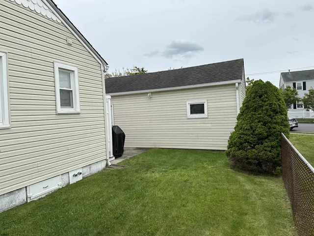 a view of a back yard of the house