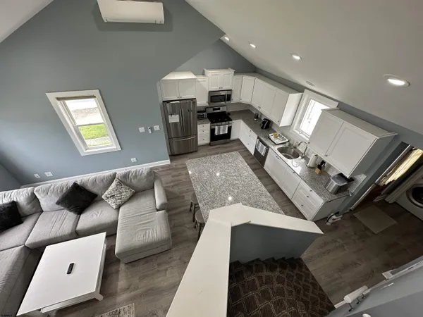 a living room with furniture and a couch