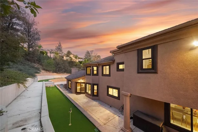 a kitchen with a sink stainless steel appliances and cabinets