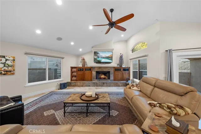a white bath tub sitting in a bathroom next to a window