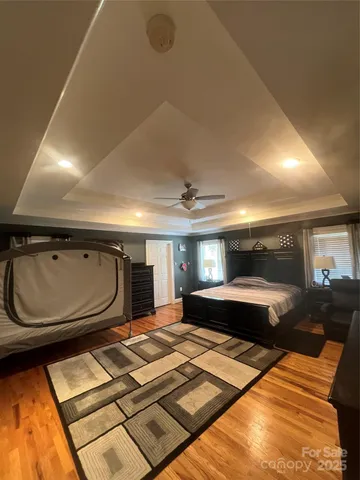 a bathroom with a bathtub and a window