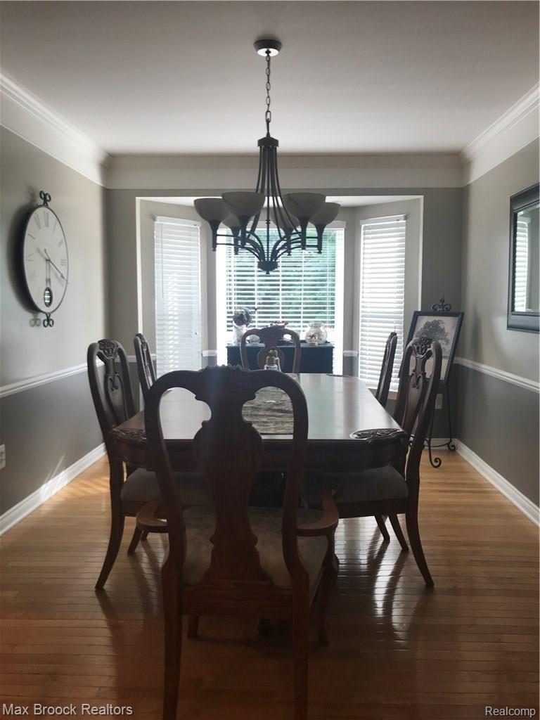 35 Ridge Field Court Oxford, MI 48371 - Photo 12 of 23 Large formal dining room with bay window