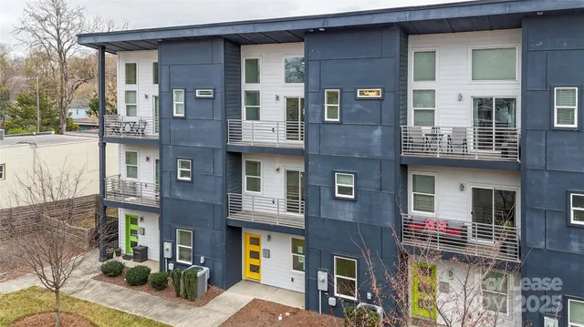 a front view of a building with many windows