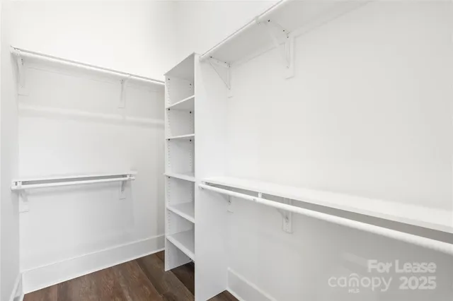 a view of an empty walk in closet