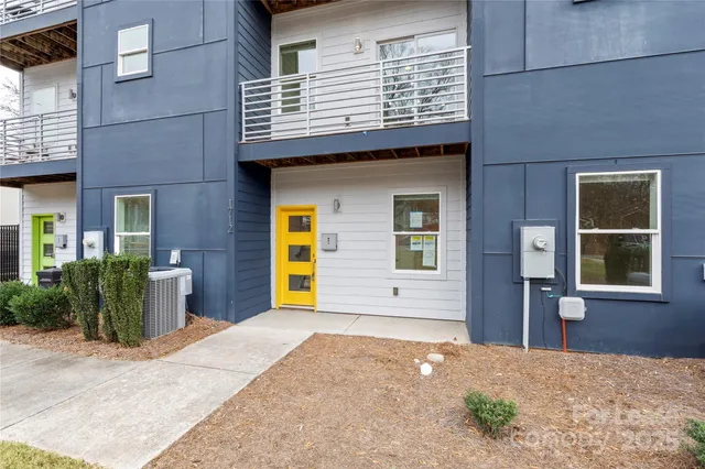 a view of a house with large space and a yard