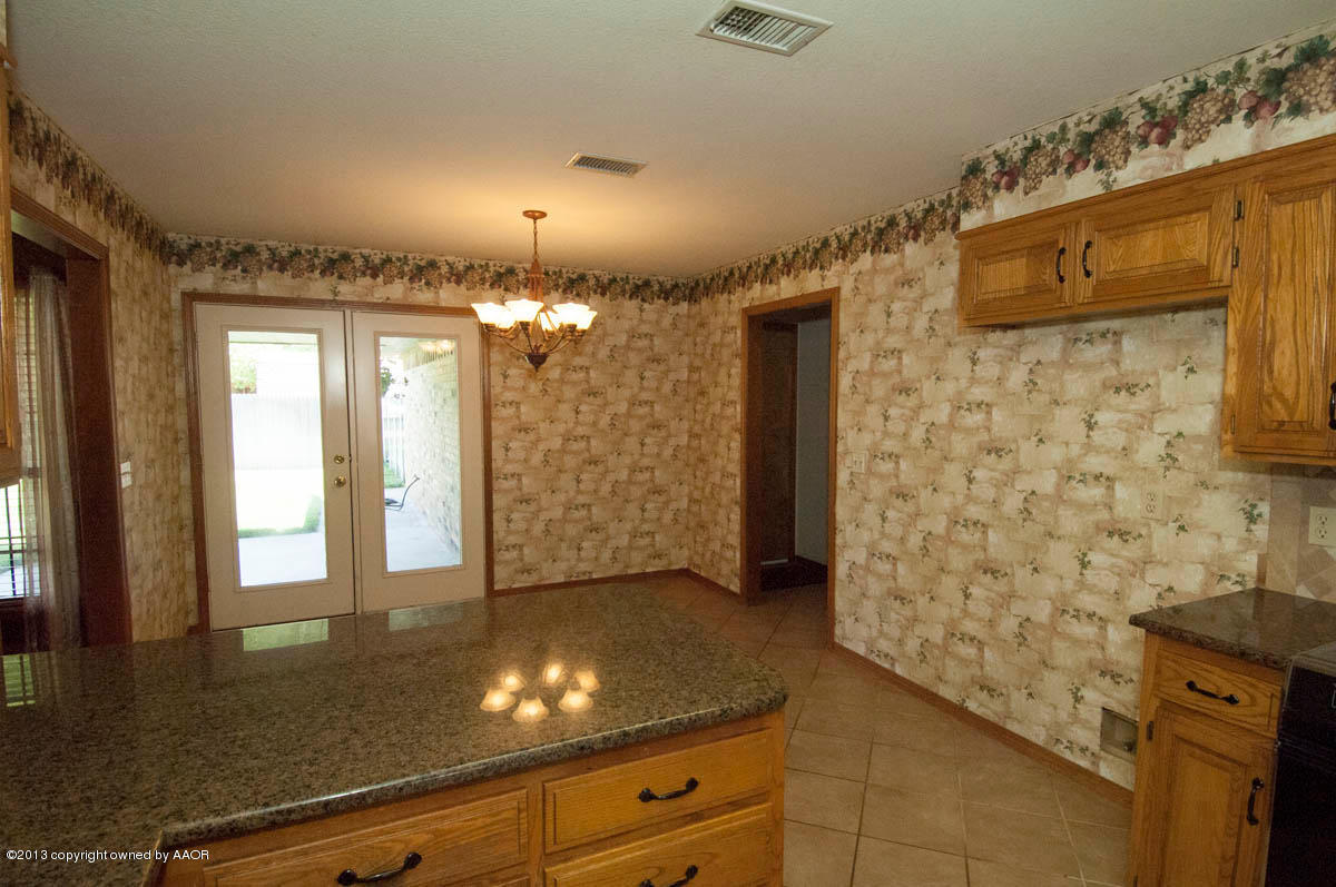 7305 Old Kent Road Amarillo, TX 79109 - Photo 9 of 48 KITCHEN VIEW 1