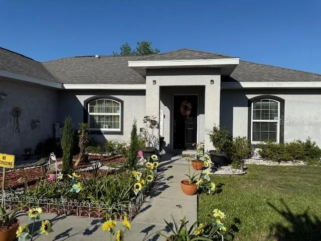 front view of house with a yard