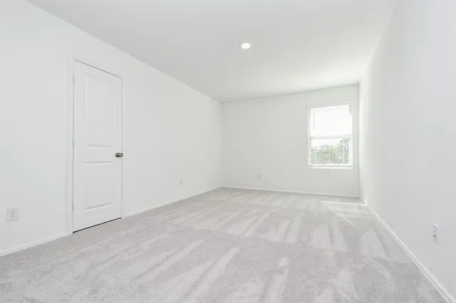 a view of a room with an empty space