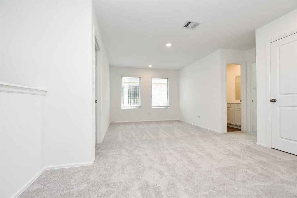 2932 Tantara Drive Katy, TX 77493 - Photo 13 of 34 an empty room with windows