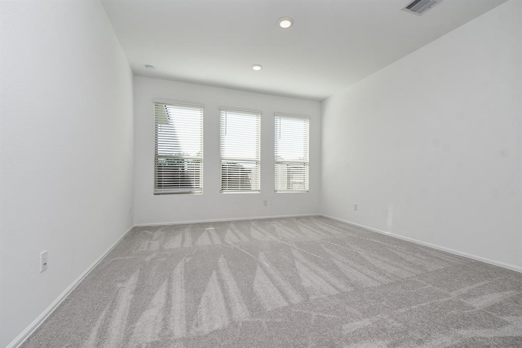 2932 Tantara Drive Katy, TX 77493 - Photo 14 of 34 an empty room with windows