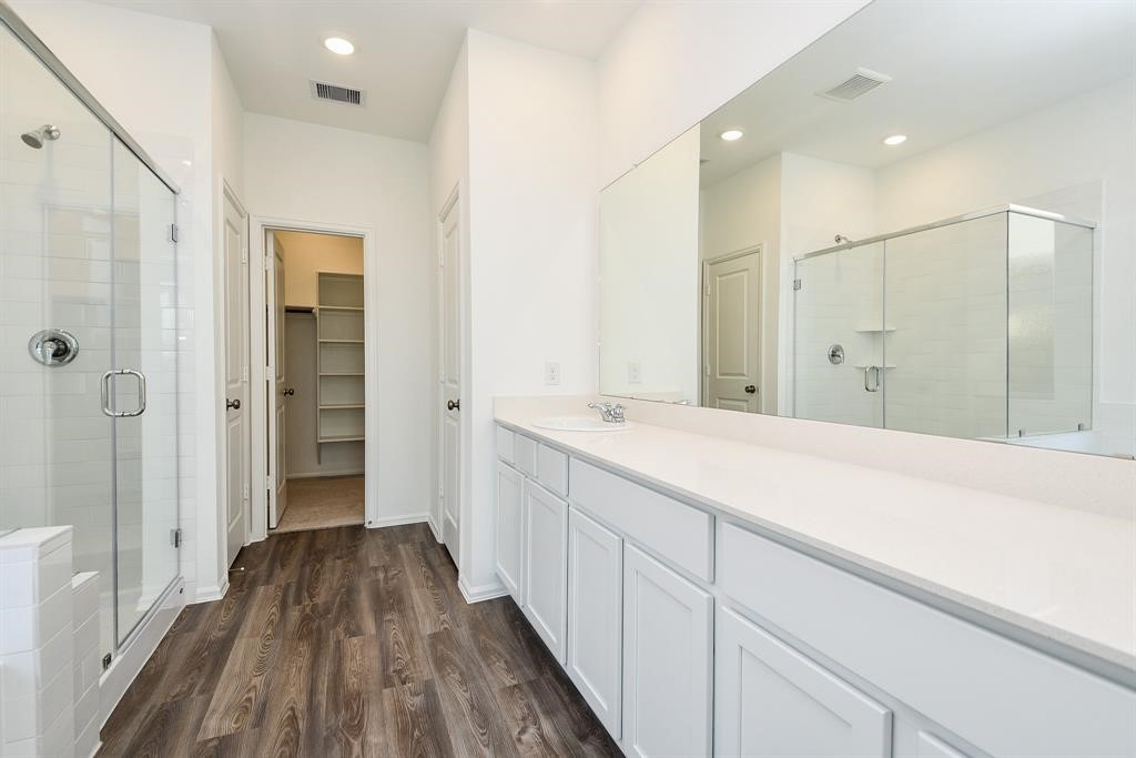 2932 Tantara Drive Katy, TX 77493 - Photo 21 of 34 a spacious bathroom with a shower and a sink
