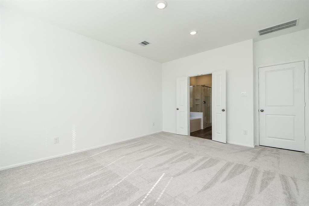 2932 Tantara Drive Katy, TX 77493 - Photo 22 of 34 a view of an empty room