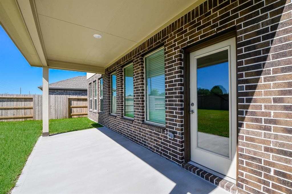2932 Tantara Drive Katy, TX 77493 - Photo 32 of 34 a view of a porch with a yard