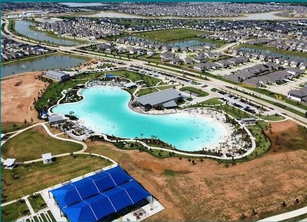 2932 Tantara Drive Katy, TX 77493 - Photo 34 of 34 an aerial view of a house with a lake view