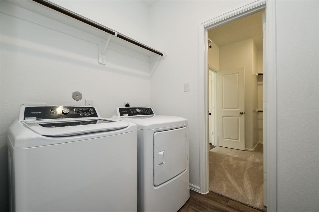 2932 Tantara Drive Katy, TX 77493 - Photo 5 of 34 a utility room with dryer and washer