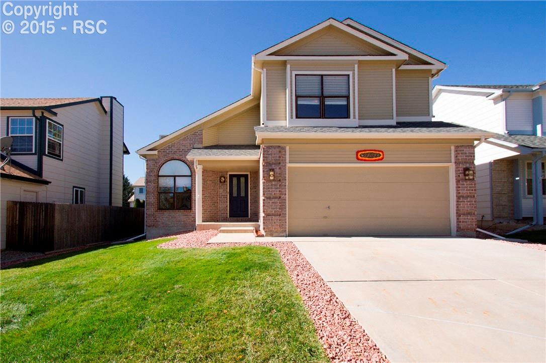 7808 Swiftrun Road Colorado Springs, CO 80920 - Photo 1 of 33 Beautifully Maintained Home with Great Curb Appeal