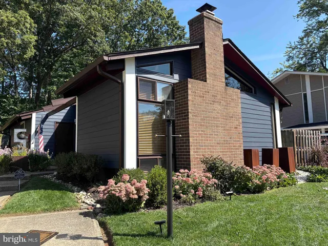a front view of house with yard