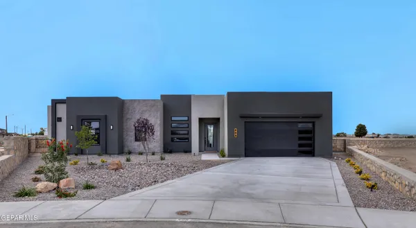 a view of a house with a garage