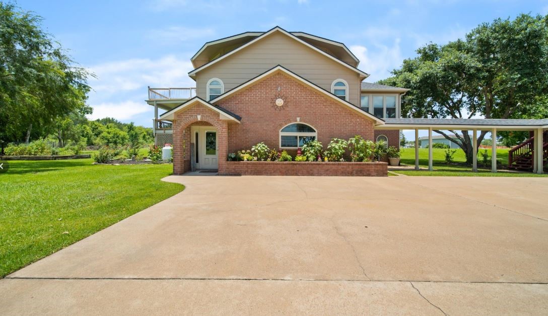 6714 Spray Lane, Unit C699A Rosharon, TX 77583 - Photo 47 of 48 My Front Door faces East. There's plenty of Additional Concrete Parking for Guest. Covered Walkway to the 4 Car Detached Garage.