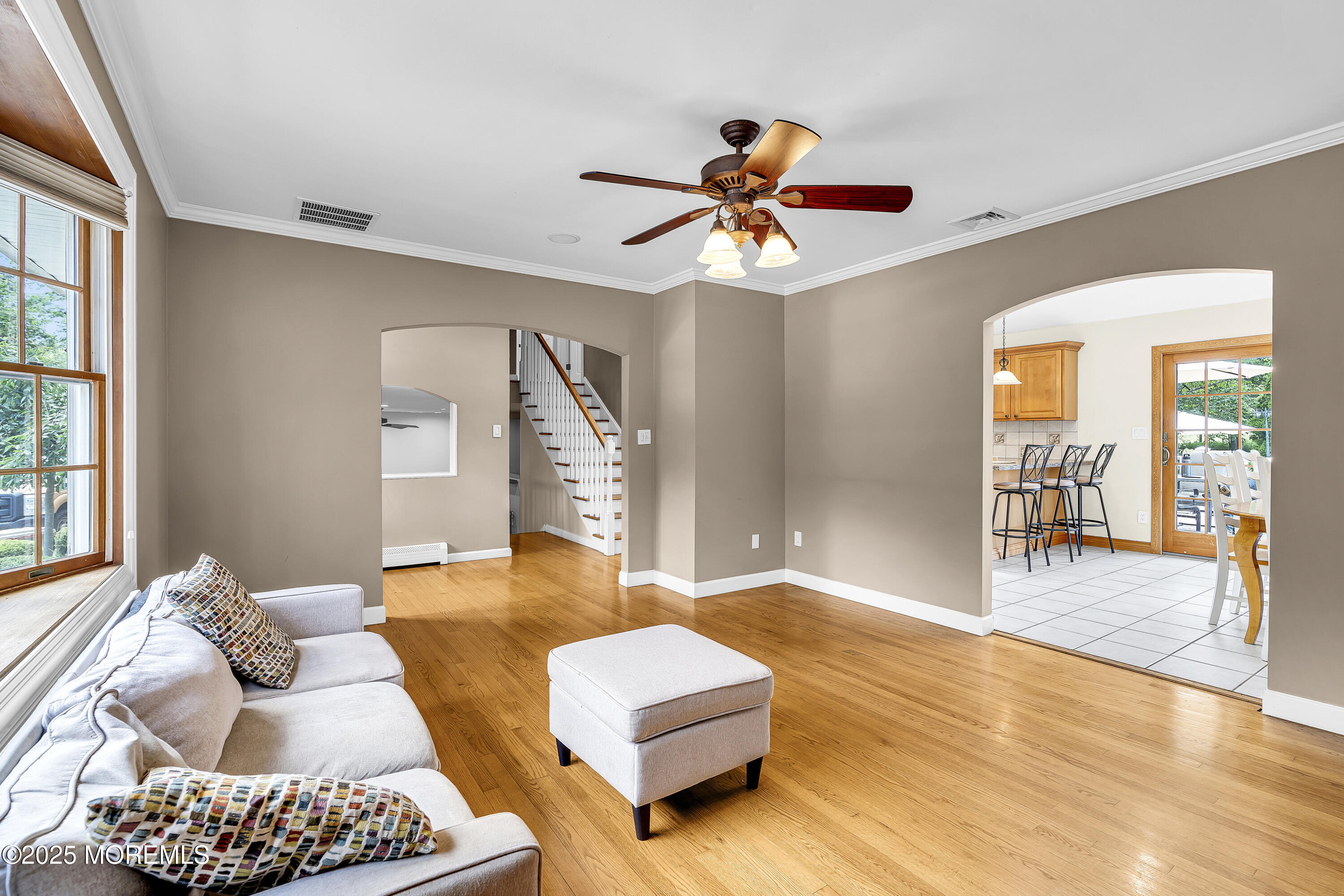 40 Centerville Road Holmdel, NJ 07733 - Photo 11 of 60 a living room with furniture and a large window