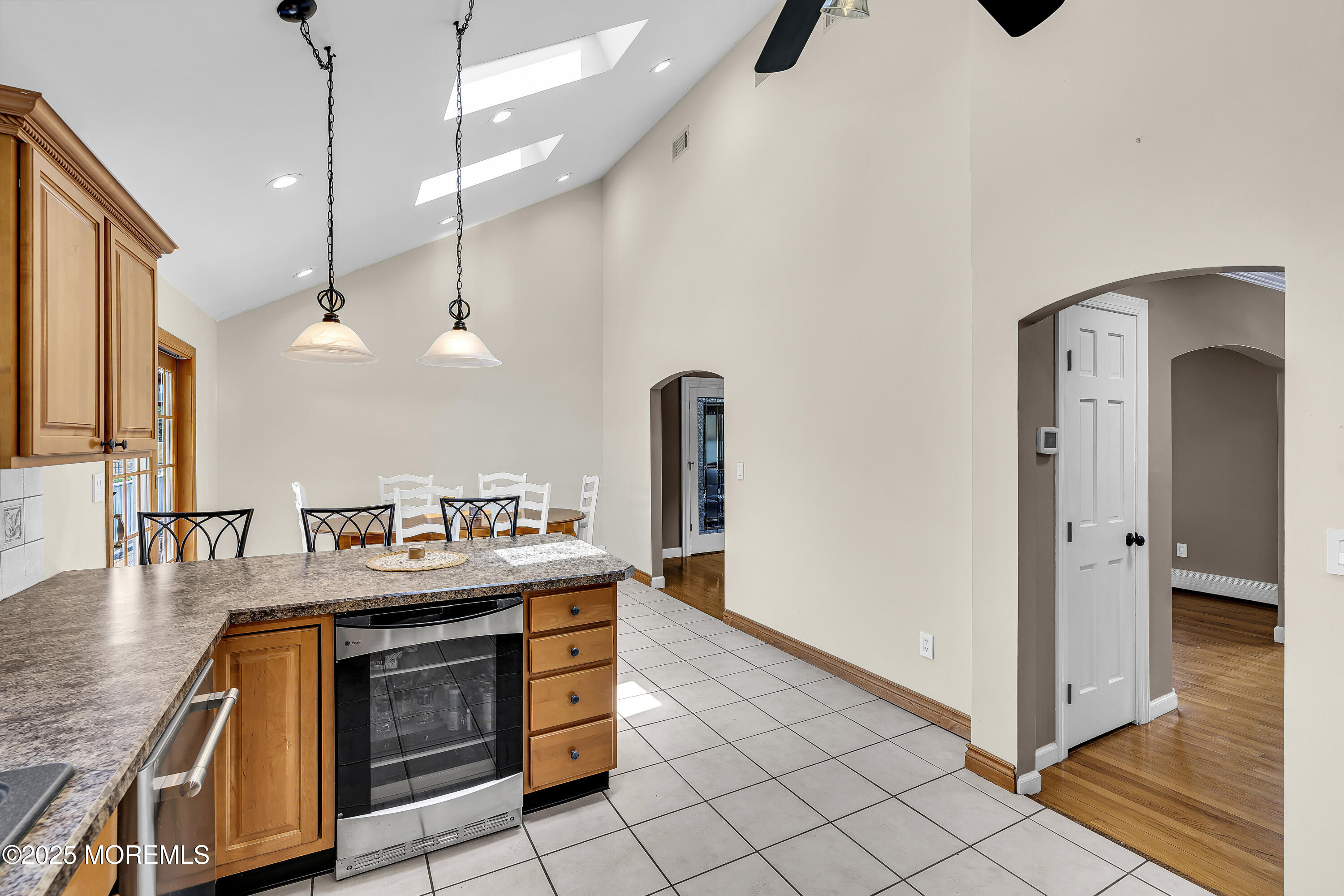 40 Centerville Road Holmdel, NJ 07733 - Photo 15 of 60 a kitchen with stainless steel appliances granite countertop a sink a stove and a refrigerator