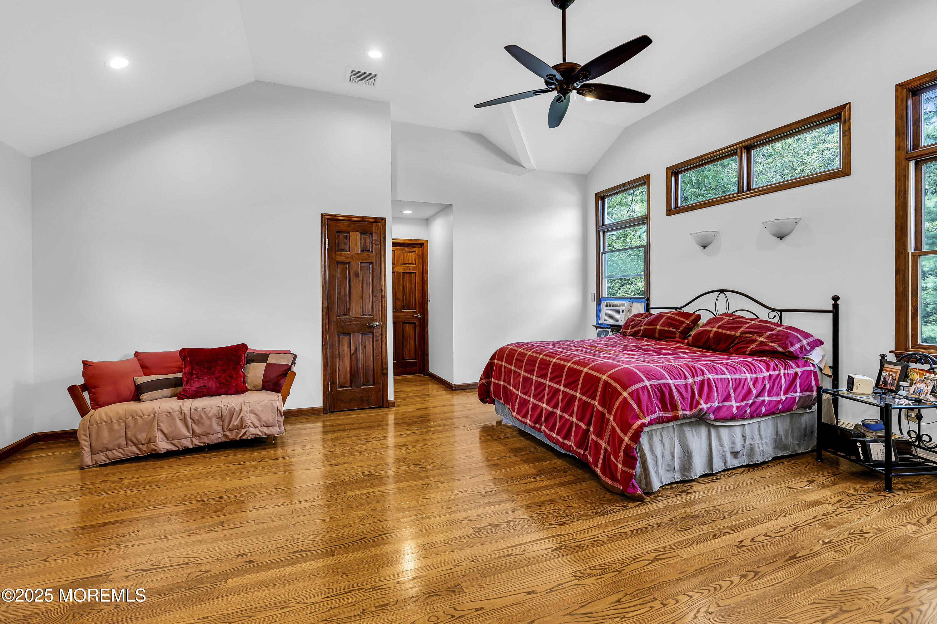 40 Centerville Road Holmdel, NJ 07733 - Photo 22 of 60 a bedroom with a bed and ceiling fan