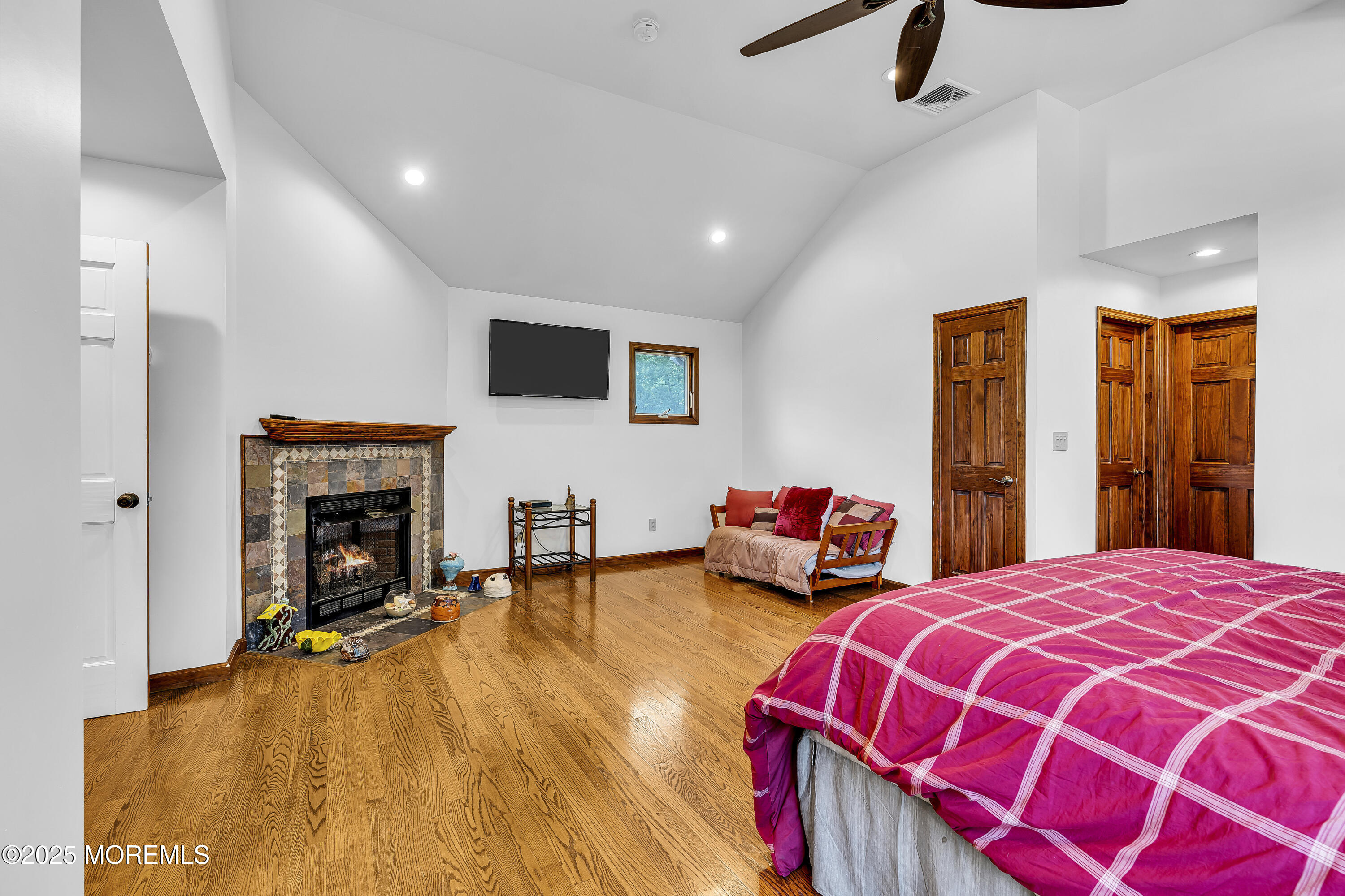 40 Centerville Road Holmdel, NJ 07733 - Photo 24 of 60 a bedroom with bed and a flat tv screen