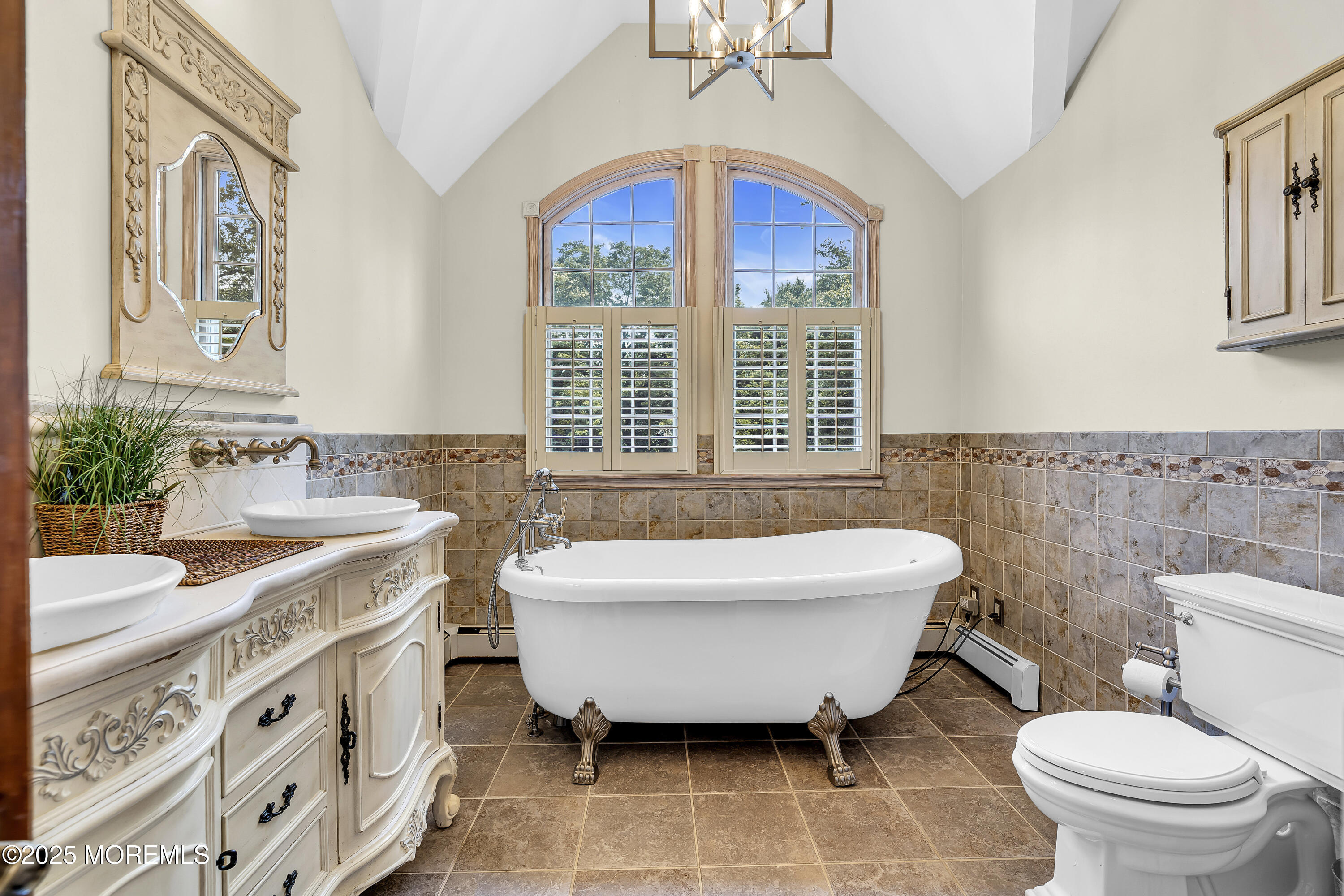40 Centerville Road Holmdel, NJ 07733 - Photo 27 of 60 a spacious bathroom with a bathtub a sink and a toilet