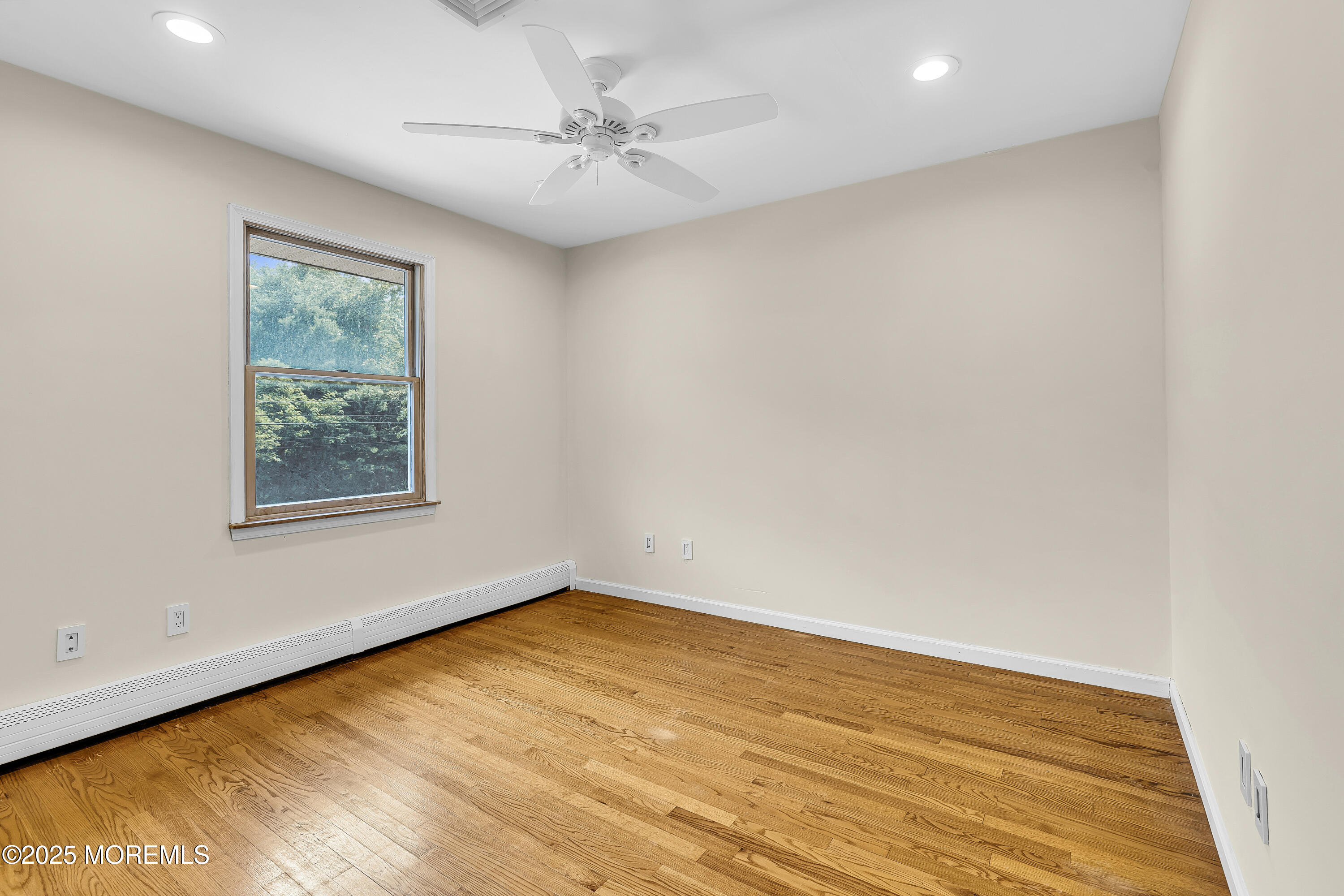 40 Centerville Road Holmdel, NJ 07733 - Photo 34 of 60 an empty room with a window