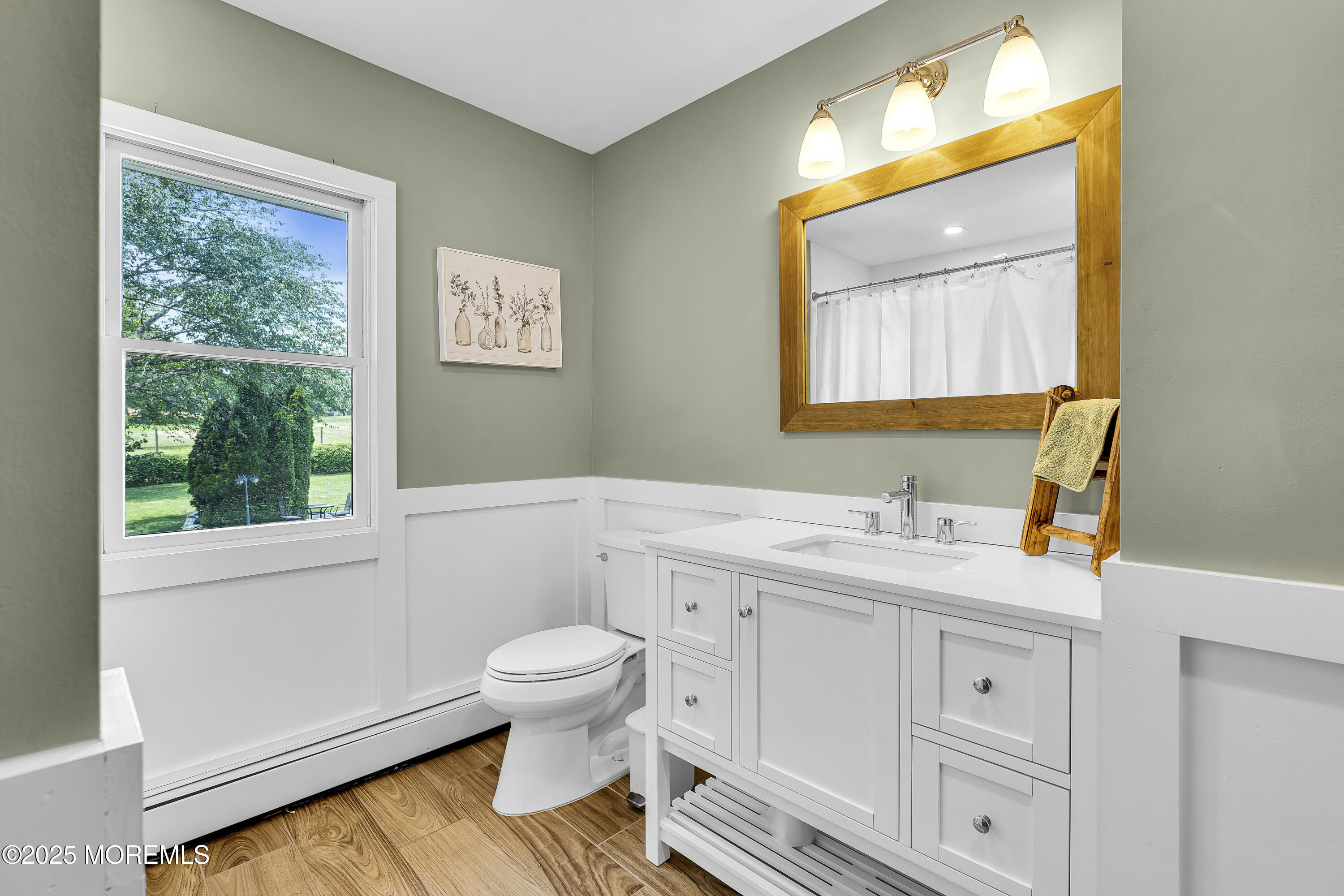 40 Centerville Road Holmdel, NJ 07733 - Photo 37 of 60 a bathroom with a sink toilet and window