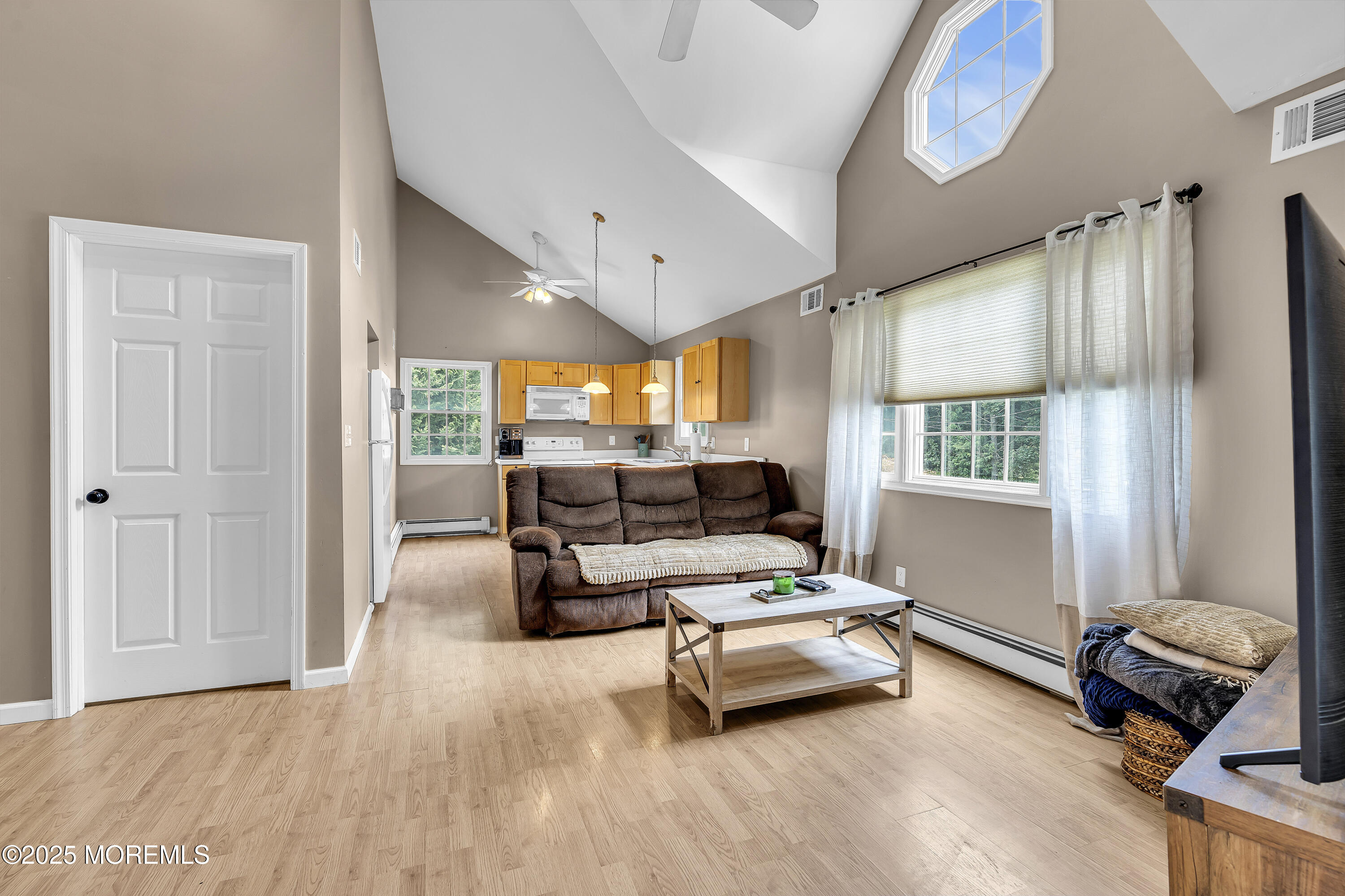 40 Centerville Road Holmdel, NJ 07733 - Photo 38 of 60 a living room with furniture and a large window