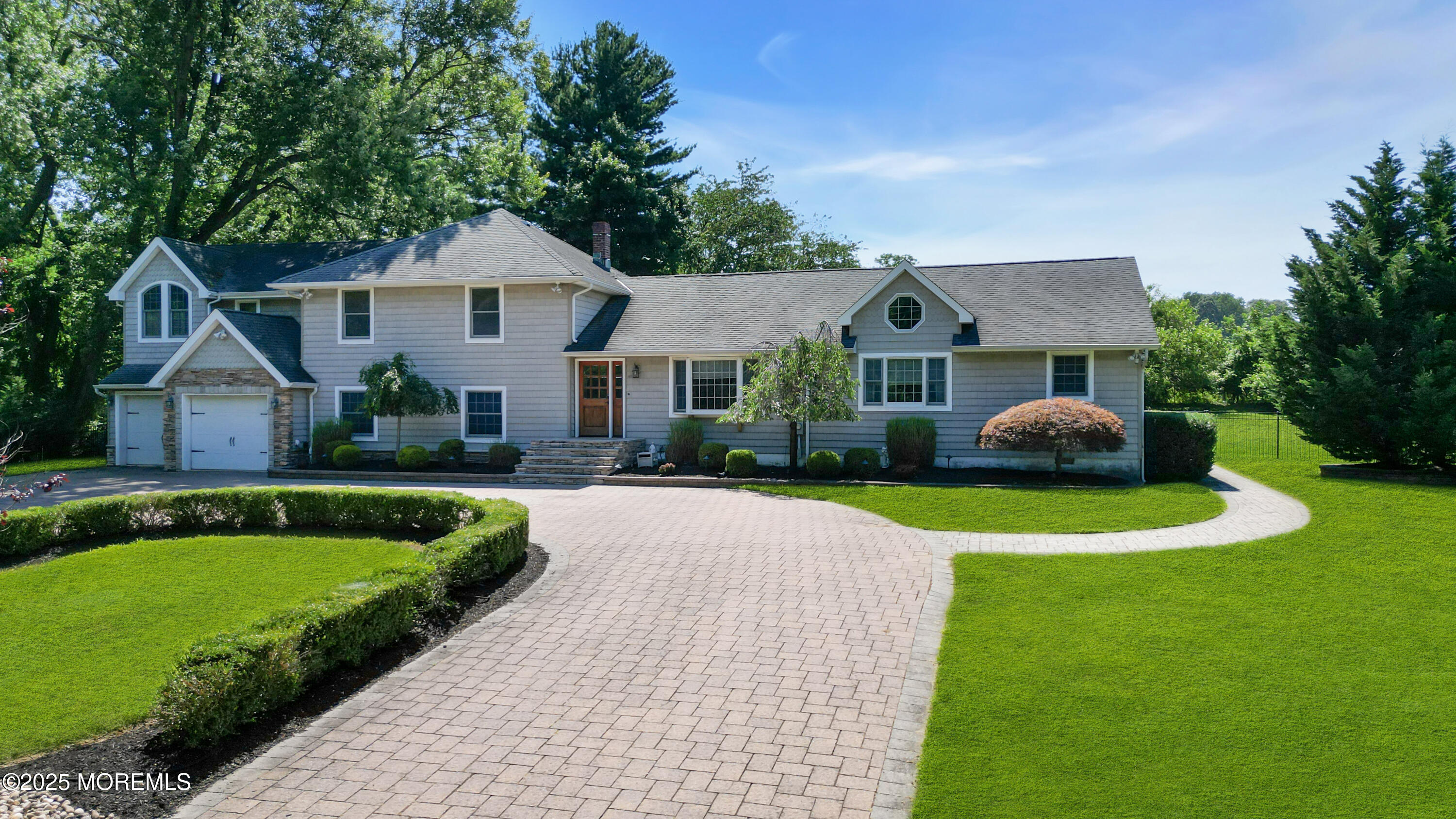 40 Centerville Road Holmdel, NJ 07733 - Photo 4 of 60 a front view of house with yard and green space
